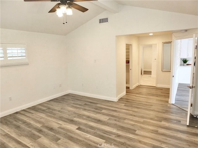 729 E Emerson Ave, Orange, CA 92865 - unfurnished room with a ceiling fan, visible vents, wood finished floors, baseboards, and vaulted ceiling with beams