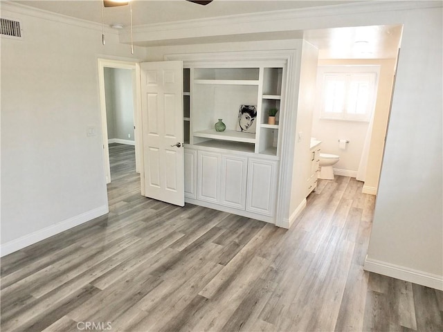 729 E Emerson Ave, Orange, CA 92865 - interior space featuring crown molding, baseboards, visible vents, and light wood-style floors