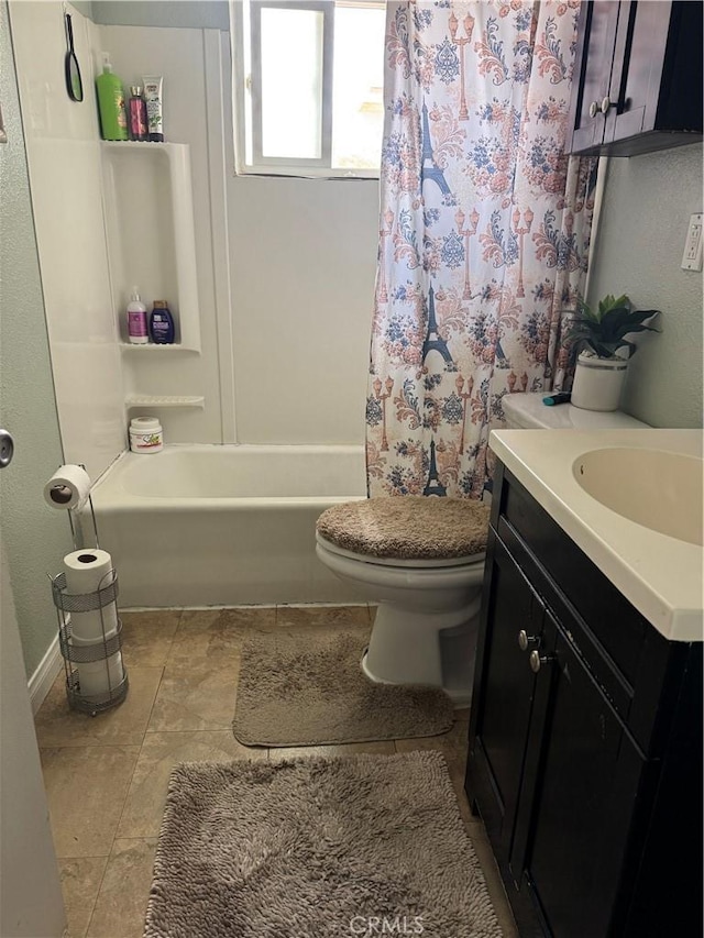 full bathroom with vanity, baseboards, toilet, and shower / tub combo with curtain