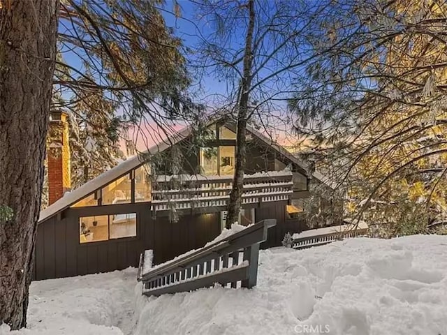 exterior space featuring a chimney