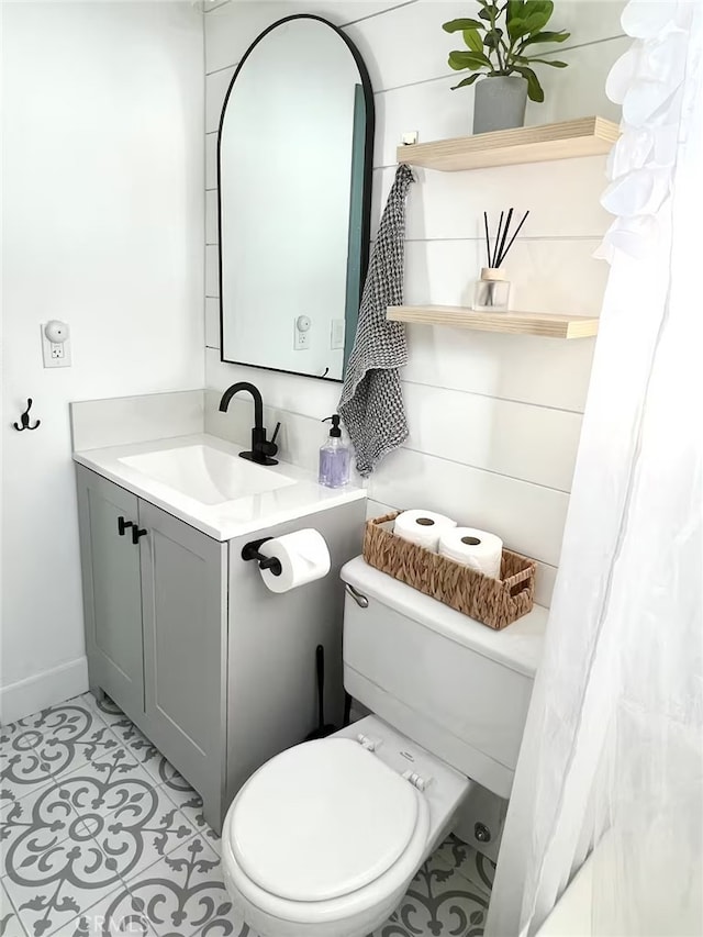 2012 Poplar Dr, Running Springs, CA 92382 - bathroom with toilet, vanity, baseboards, and tile patterned floors