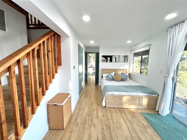 2012 Poplar Dr, Running Springs, CA 92382 - bedroom with access to outside, wood finished floors, recessed lighting, and baseboards