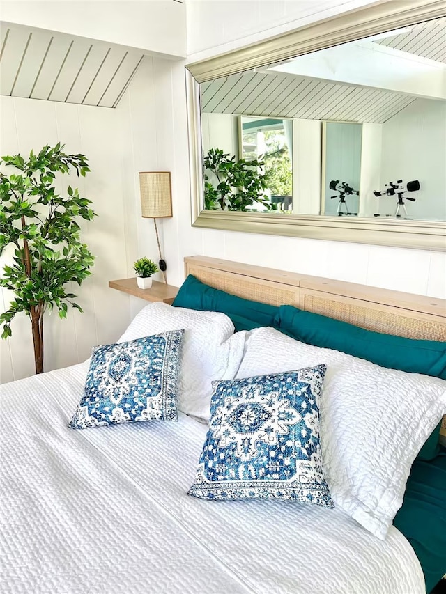 bedroom featuring beam ceiling