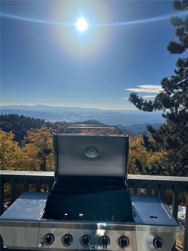 details with a view of trees and a mountain view