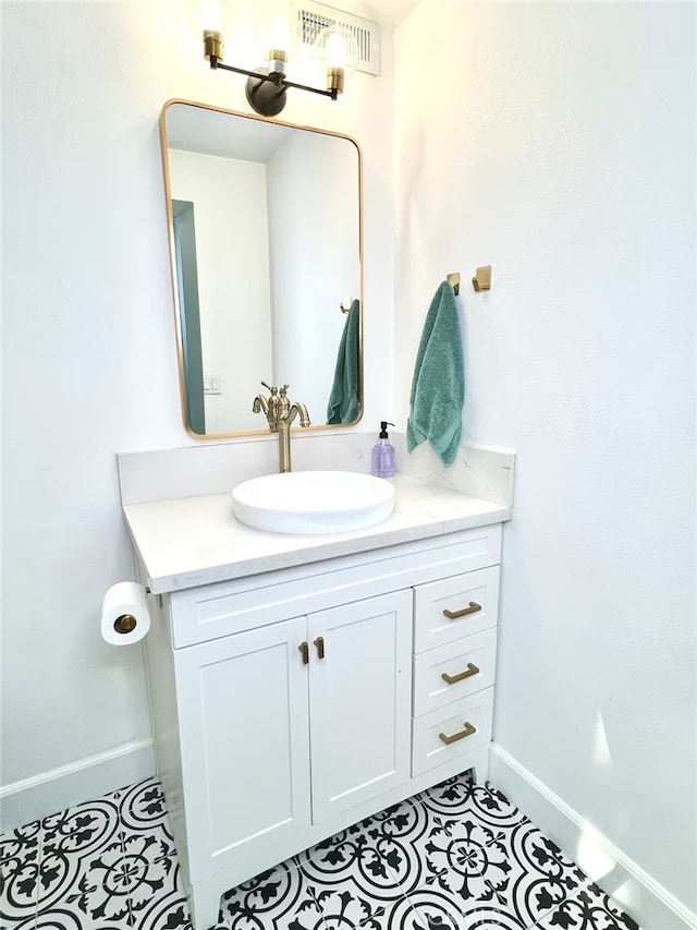 2012 Poplar Dr, Running Springs, CA 92382 - bathroom featuring baseboards, tile patterned flooring, and vanity