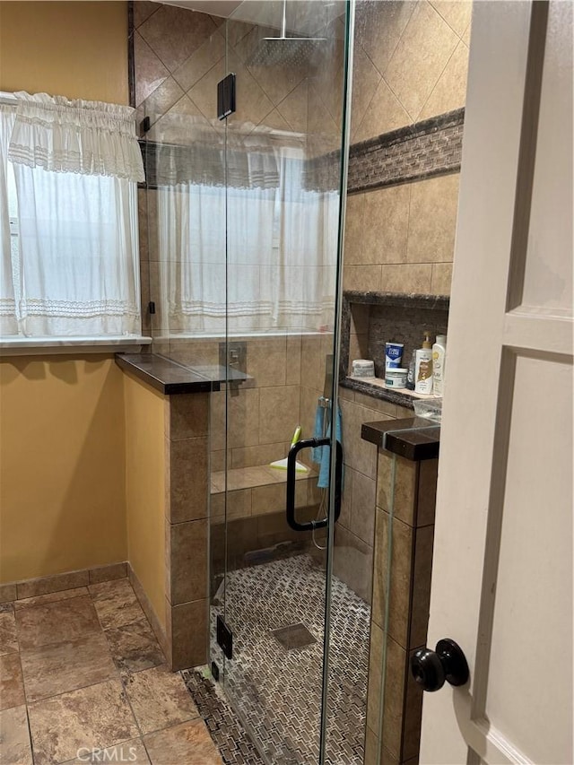 812 N Dickel St, Anaheim, CA 92805 - full bathroom with a shower stall, stone tile flooring, and baseboards