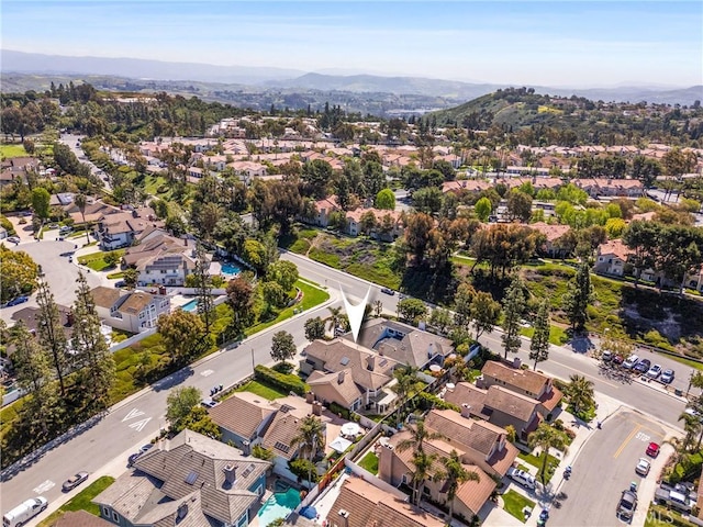 bird's eye view featuring a mountain view and a residential view