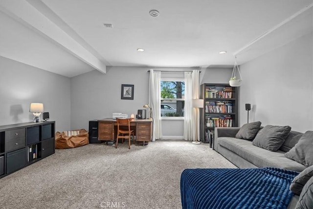 living area featuring carpet floors, visible vents, and vaulted ceiling with beams