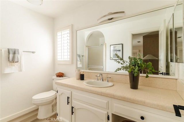 1541 Indiana Ave, South Pasadena, CA 91030 - bathroom with vanity, a stall shower, and toilet