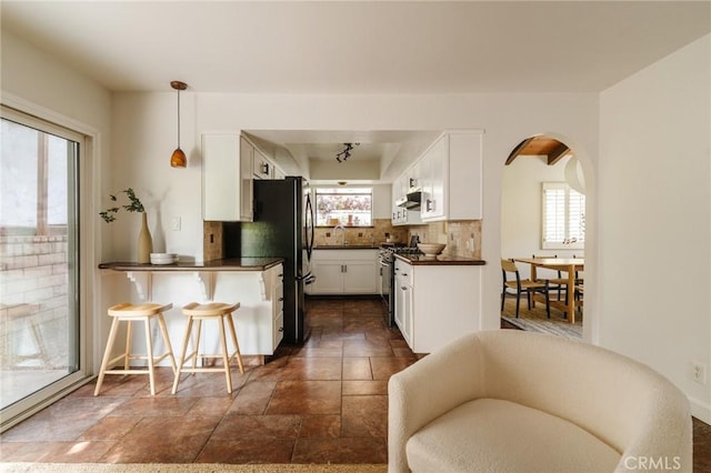 1541 Indiana Ave, South Pasadena, CA 91030 - kitchen featuring plenty of natural light, dark countertops, and stainless steel appliances