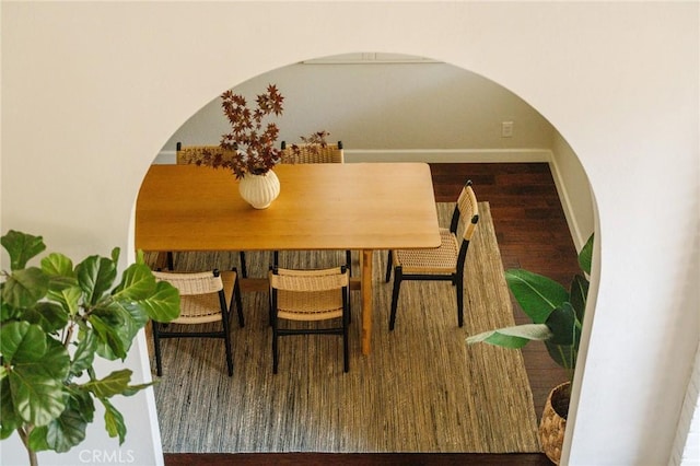 1541 Indiana Ave, South Pasadena, CA 91030 - dining room featuring baseboards, arched walkways, and wood finished floors