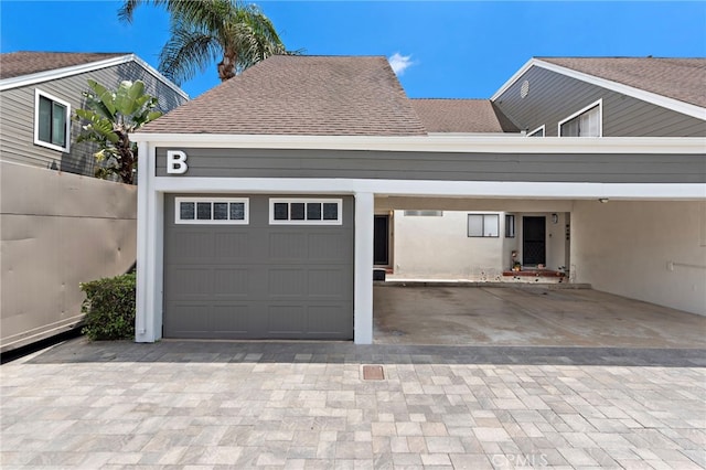 garage with driveway
