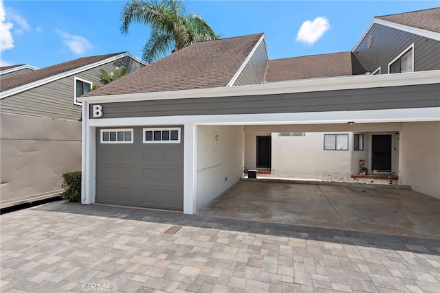 garage with driveway