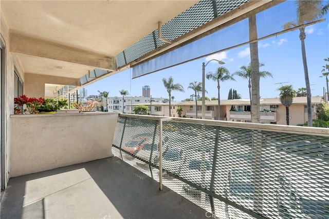 balcony featuring a residential view