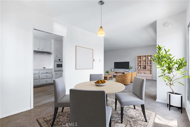 dining space with baseboards