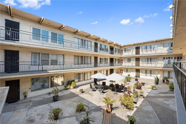 view of home's community featuring a patio