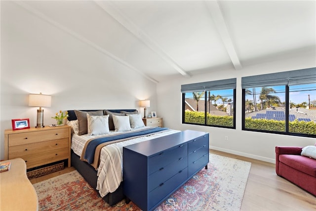 9401 Gateshead Dr, Huntington Beach, CA 92646 - bedroom with baseboards, lofted ceiling with beams, and wood finished floors