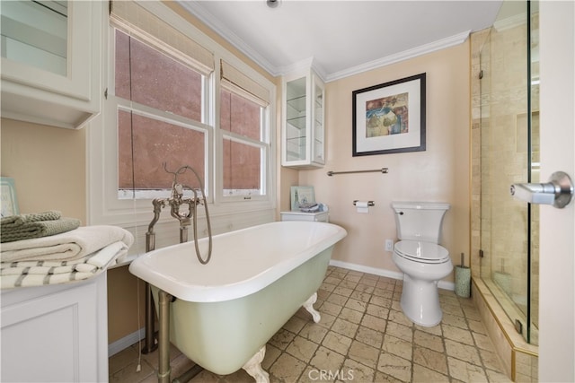 full bathroom featuring toilet, a freestanding bath, stone tile flooring, crown molding, and a shower stall