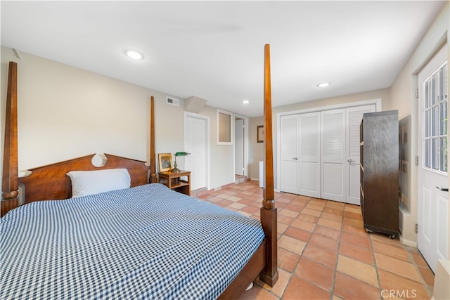 bedroom with a closet and recessed lighting