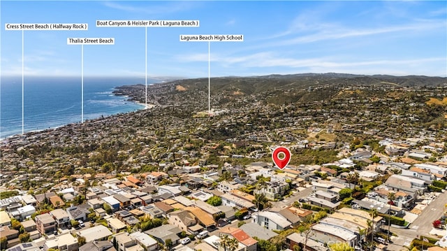 aerial view of residential area with a water and mountain view