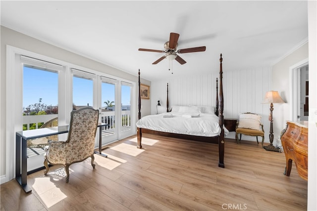 bedroom featuring ornamental molding, access to outside, light wood finished floors, ceiling fan, and baseboards