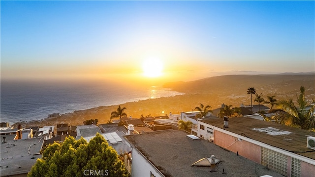 water view featuring local beach and a mountain backdrop