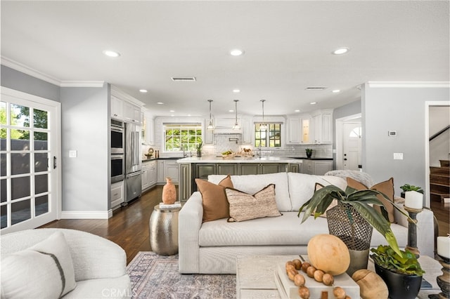 living area featuring crown molding, recessed lighting, stairs, and dark wood-style floors