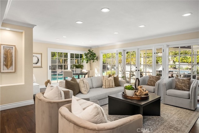 living room featuring baseboards, ornamental molding, dark wood finished floors, and recessed lighting