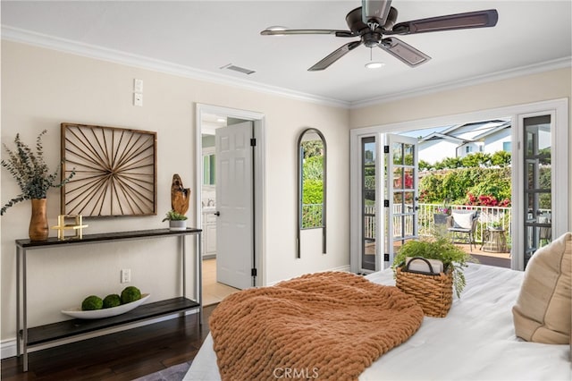 bedroom with visible vents, ornamental molding, wood finished floors, access to outside, and a ceiling fan