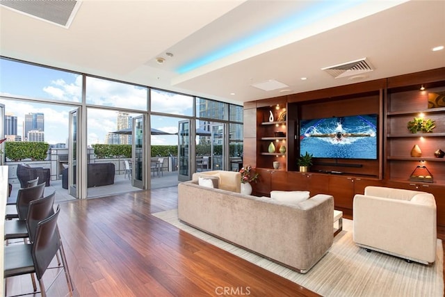 1155 S Grand Ave Unit 1011, Los Angeles, CA 90015 - building lobby with a view of city, floor to ceiling windows, and recessed lighting