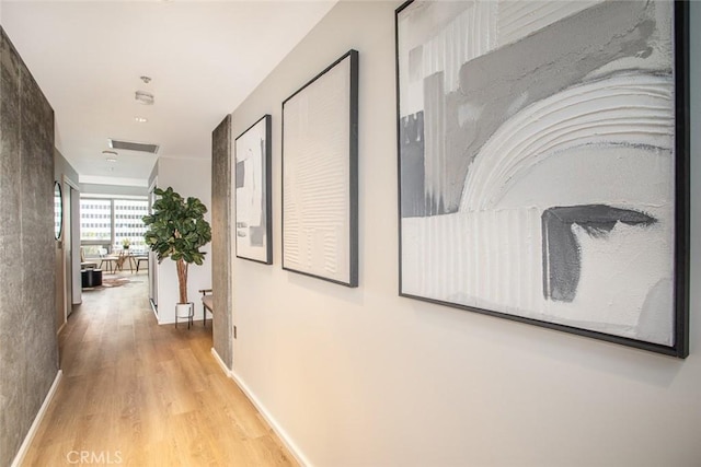 1155 S Grand Ave Unit 1011, Los Angeles, CA 90015 - hall featuring light wood-style floors and baseboards