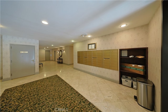 hall featuring mail area, recessed lighting, baseboards, wallpapered walls, and light tile patterned floors