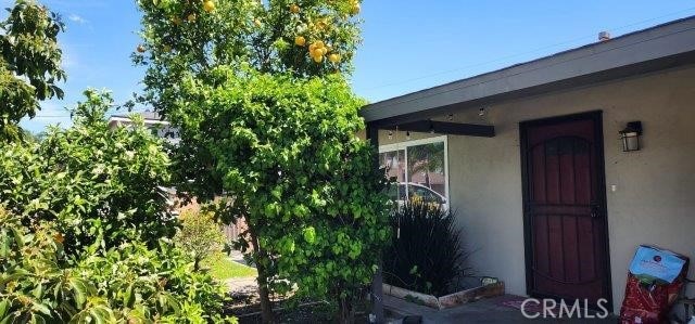 15220 Terracedale Dr, La Mirada, CA 90638 - view of exterior entry featuring stucco siding