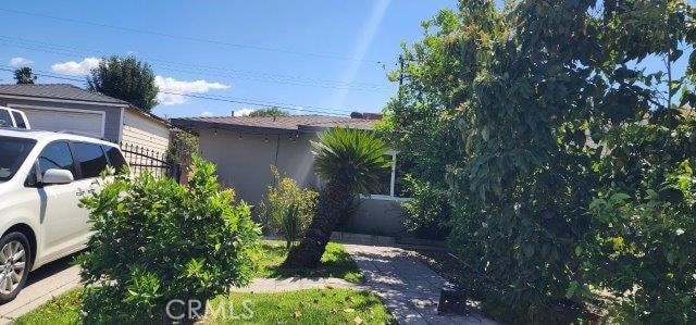 view of side of home with a garage