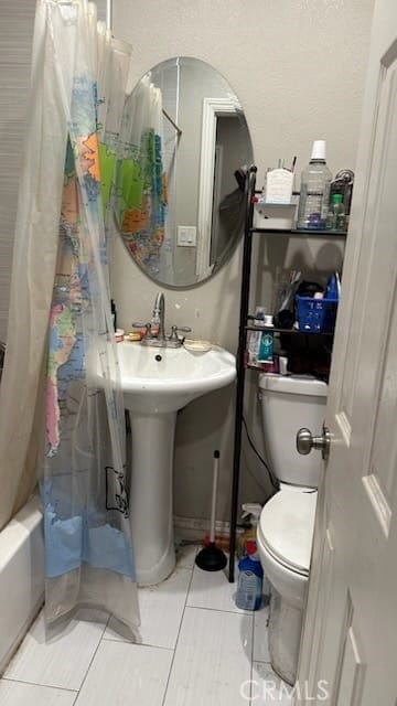 15220 Terracedale Dr, La Mirada, CA 90638 - full bath with toilet, tile patterned flooring, and shower / tub combo