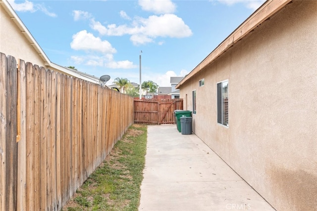 view of yard featuring a patio and fence
