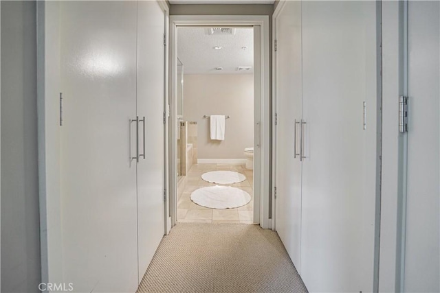 3141 Michelson Dr Unit 508, Irvine, CA 92612 - corridor featuring light tile patterned floors