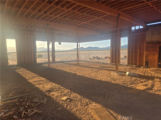 view of stable featuring a mountain view