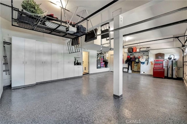 garage featuring baseboards and a garage door opener