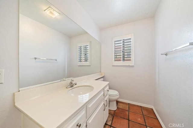 1101 Portofino Ct Unit 103, Corona, CA 92881 - half bath with toilet, baseboards, vanity, and tile patterned flooring