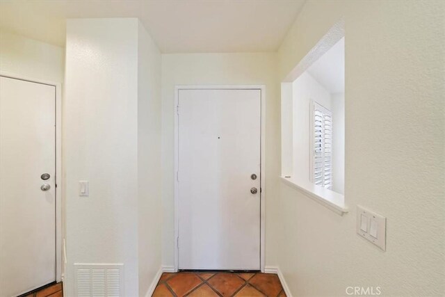 1101 Portofino Ct Unit 103, Corona, CA 92881 - entryway featuring baseboards