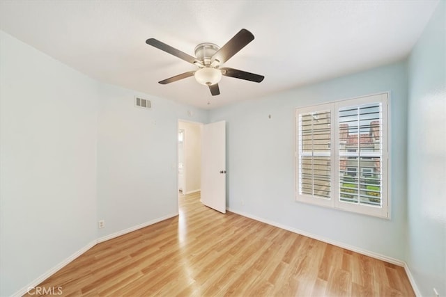 1101 Portofino Ct Unit 103, Corona, CA 92881 - unfurnished room with light wood-type flooring, a ceiling fan, and baseboards