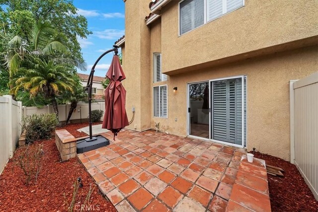 1101 Portofino Ct Unit 103, Corona, CA 92881 - fenced backyard with a patio area
