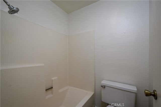 full bathroom featuring toilet