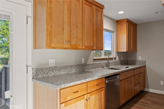kitchen with stainless steel dishwasher, light stone countertops, baseboards, dark wood-type flooring, and a sink