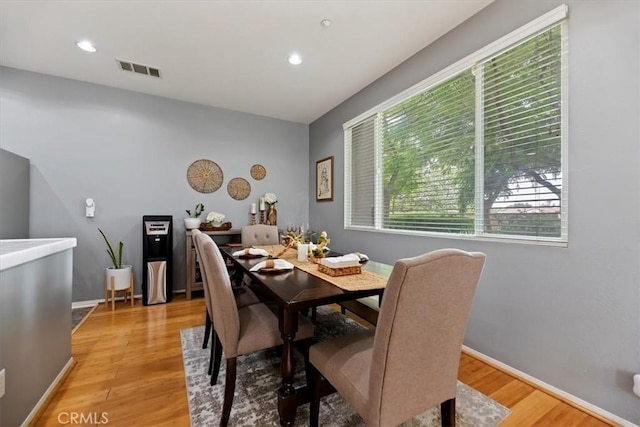 dining space featuring recessed lighting, baseboards, light wood-type flooring, and visible vents