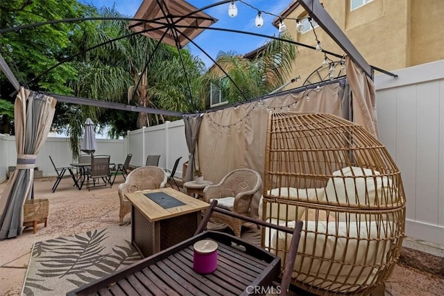balcony with a patio area and outdoor dining space