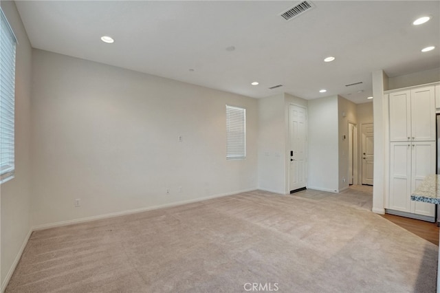 22824 W Olive Way, Canoga Park, CA 91304 - spare room featuring baseboards, light colored carpet, recessed lighting, and visible vents