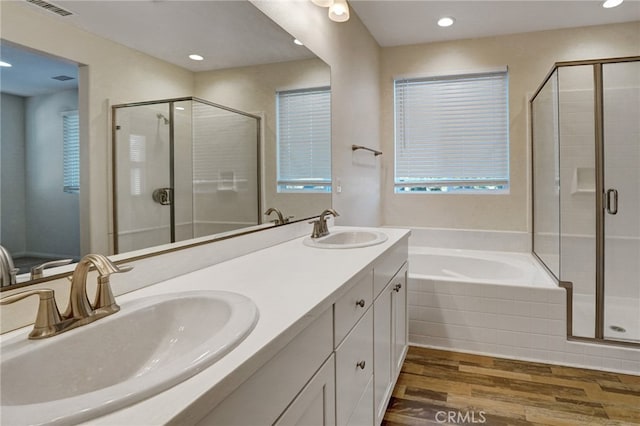 22824 W Olive Way, Canoga Park, CA 91304 - full bath with a garden tub, a sink, wood finished floors, and a shower stall