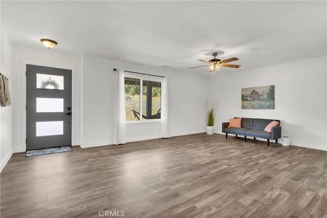 10634 Mesquite St, Oak Hills, CA 92344 - entrance foyer featuring baseboards, ceiling fan, and wood finished floors